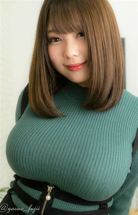 While walking down the street, two women stop in their tracks when they see the buxom blonde approaching with her triple-L breasts. . Asian big boo